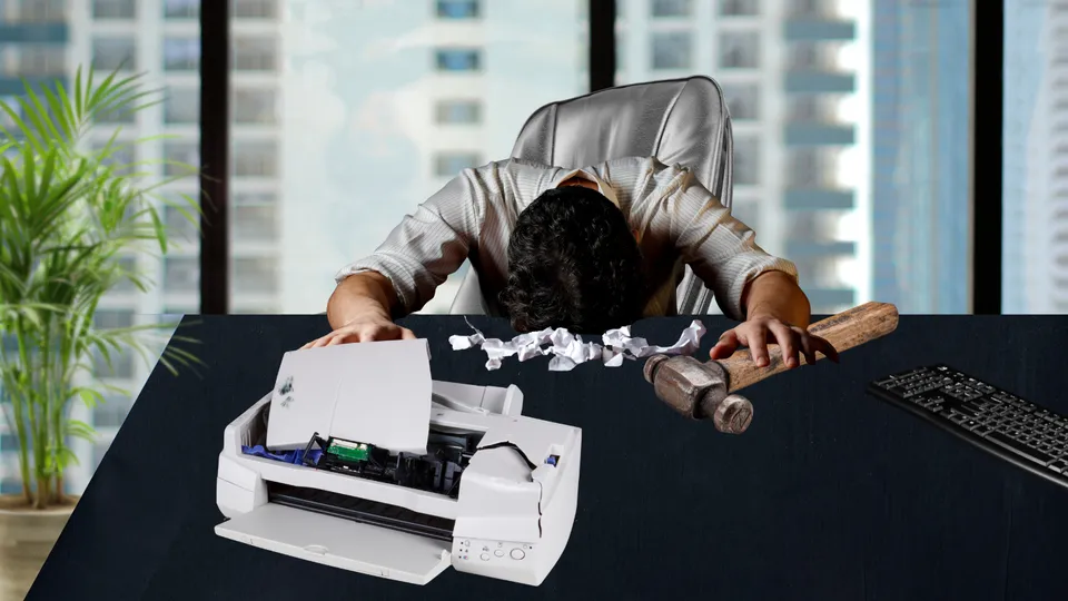 Frustrated person trying to print on a label sheet